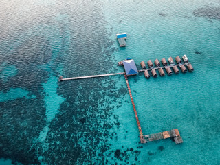 Aerial view of water chalet resort in Bum Bum Island in Semporna, Sabah, Malaysia.