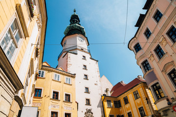 Fototapeta na wymiar Michael Tower gate and old town medieval buildings in Bratislava, Slovakia
