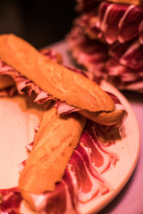 Pile of jamon sandwiches
