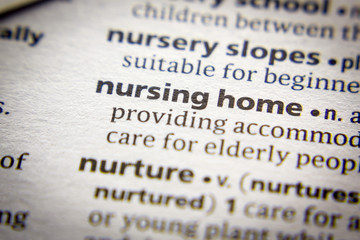 Obraz premium Word or phrase Nursing home in a dictionary.