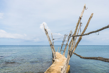 The small dock with the typical wooden cranes of Savudrija, Croatia