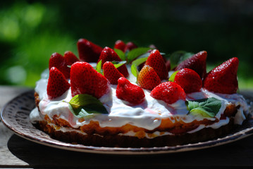 cake with strawberries and cream