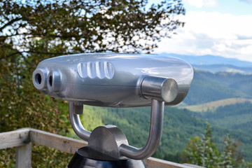 Binoculars on a mountaintop