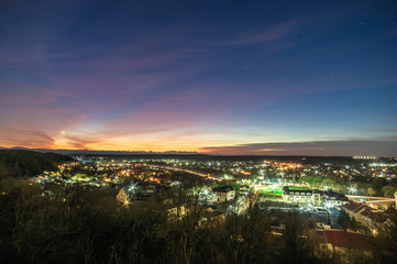 Fototapeta premium Sunset over a small european city in autumn
