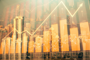 Naklejka na ściany i meble Forex chart on cityscape with skyscrapers wallpaper double exposure. Financial research concept.