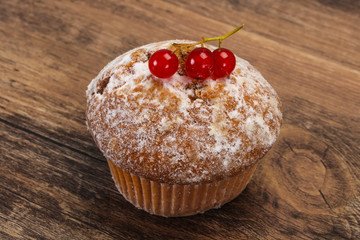 Sweet tasty muffin with red currants