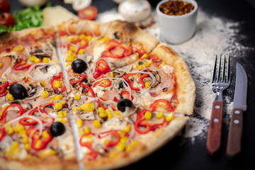 Tasty pizza, close up lock , with igredient aside. 