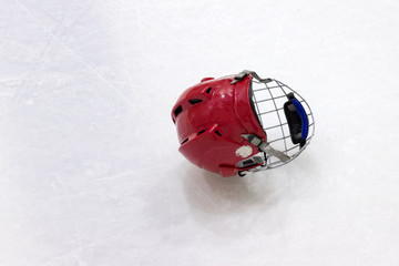 hockey helmet lies on ice