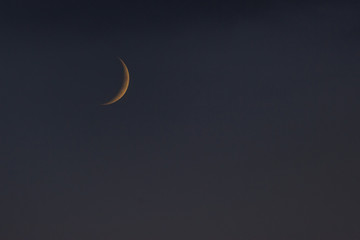 Obraz na płótnie Canvas dark evening sky and half moon