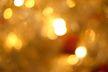 Gold blur abstract background. bokeh christmas blurred beautiful shiny Christmas lights, Christmas background concept..