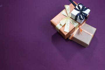 Obraz na płótnie Canvas gift boxs on purple background