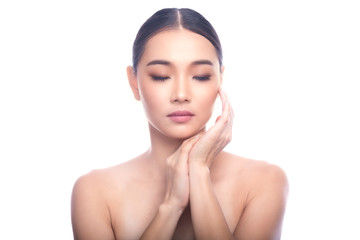 Beautiful Young Asian Woman with Clean Fresh Skin isolate on white background. Spa, Face care, Facial treatment, Beauty and Cosmetics concept. Right hand touch chin. Eye close.