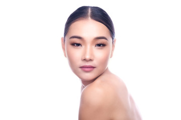 Beautiful Young Asian Woman with Clean Fresh Skin isolate on white background. Spa, Face care, Facial treatment, Beauty and Cosmetics concept. Chin on shoulder.