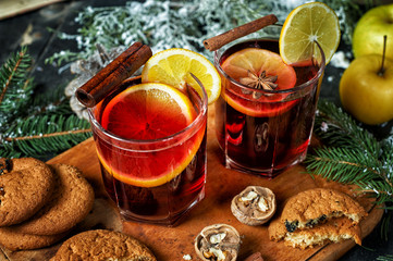 Mulled wine, a traditional Christmas hot drink on the table .
