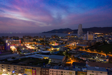 Naklejka premium Patong city Night Cars and Bikes traffic in Thailand Phuket Island