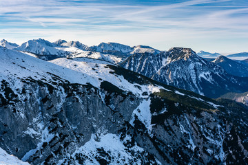 Mountain landscape in early winter scenery. View of the snow-covered peaks of the Western Tatras.