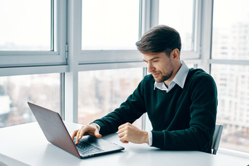 businessman working on laptop in office