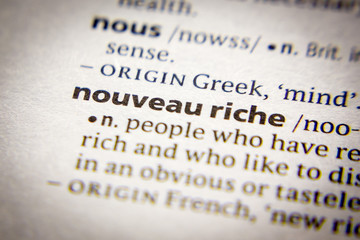 Obraz premium Word or phrase Nouveau riche in a dictionary.
