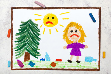 Obraz na płótnie Canvas Sad girl is looking at trash in the meadow. Ecological problem of littering the planet . Photo of colorful drawing.