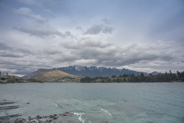 The Remarkables mountain view from Lake Wakatipu shore.