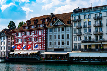 Reuss River and City of Lucerne with Luxury Hotel in Switzerland.