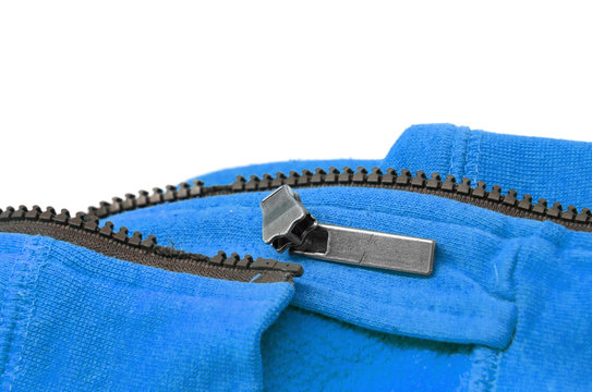 Broken zipper on blue shirt jacket. Detail close-up photo