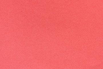 Fototapeta premium Red blank piece of paper. A high resolution photo of paper ideal as a background or texture.