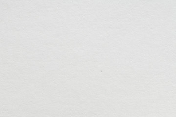 Fototapeta premium Biała pusta kartka papieru. Zdjęcie papieru o wysokiej rozdzielczości, idealne jako tło lub tekstura.