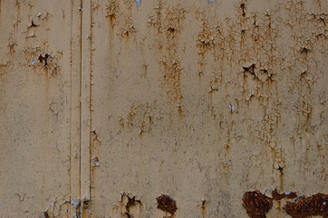 old metal wall with rusty