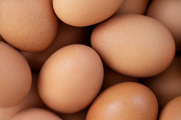 fresh chicken eggs for sale at a market. pattern background.