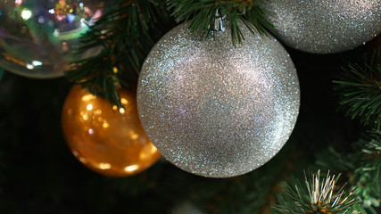 Christmas decorations on the Christmas tree. White ball.