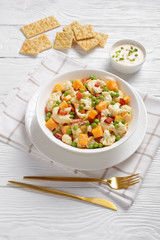 cauliflower salad with bacon, cheese, green peas