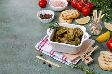 Canned green jalapeno peppers