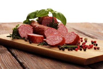 sausage slices, smoked meat product (tasty snack salami) menu concept. food background with cracow sausages