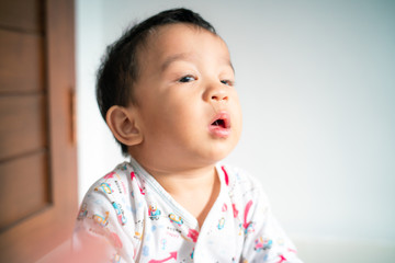 Asian baby boy was sick snot flowing from nose