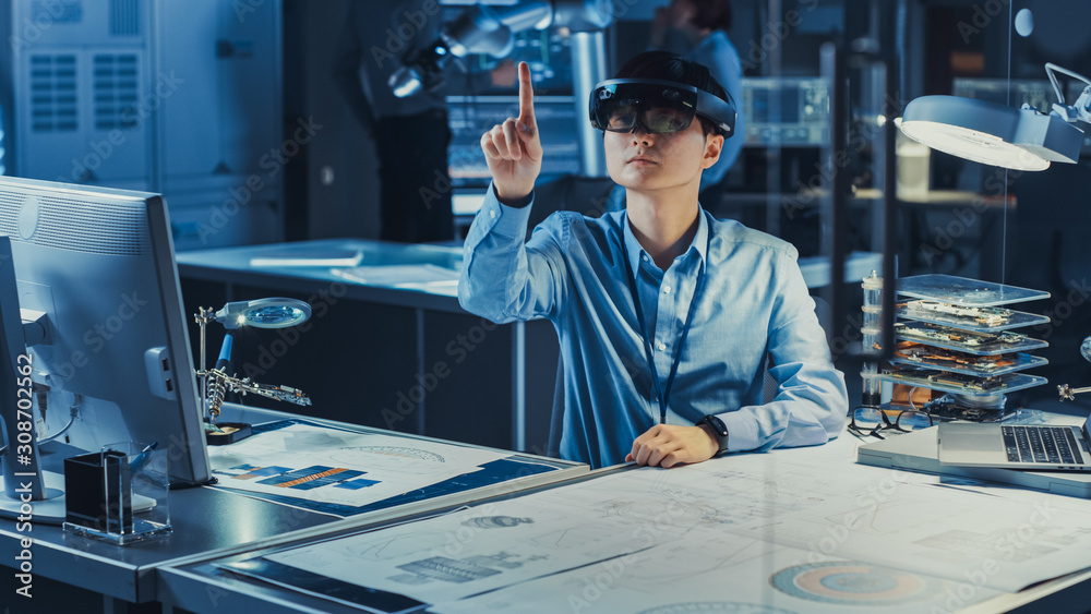 Poster professional japanese development engineer is working in a ar headset, making gestures of moving vir