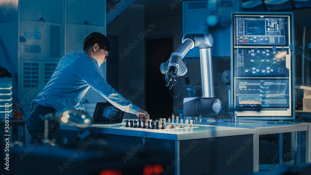 Poster Professional Japanese Development Engineer is Testing an Artificial Intelligence Interface by Playing Chess with a Futuristic Robotic Arm. They are in a High Tech Modern Research Laboratory.