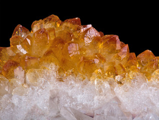 bright citrine crystals isolated on black
