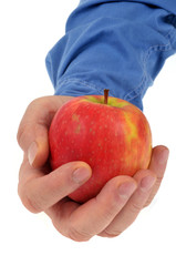 Une pomme en main