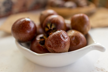 medlar is a brownish fruit of the winter