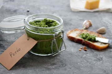 Homemade Pesto. Italian food. Pesto with basil and parmesan. Place for text