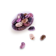 Bean grains in a plate on a white background