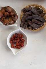 brown fruits medlar, jujube, carob