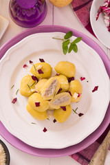 Potato gnocchi stuffed with radicchio and ricotta.