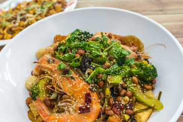 Mala Xiang Guo (stir-fry pot). China, Chongqing Sichuan Spicy Fragrant Pot. Oily, spicy, and numbing Chinese sauce which consists of peppercorn, chili pepper and various spices simmered with oil.