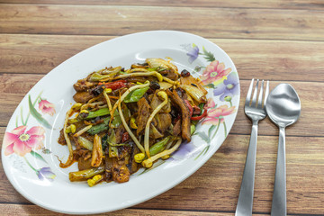Stir-fry spicy sliced beef with bean sprouts, dried chillies and spring onions. Authentic China Chinese Asian food.