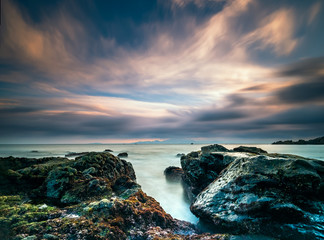 Rocks and motion blurred water in the coast of the straights of Gibraltar near Algeciras