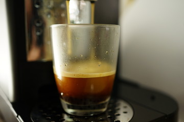 selective focus of coffee made by coffee machine