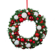 Fototapeta na wymiar christmas wreath with decorations isolated on white background