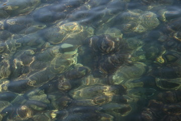 Fototapeta na wymiar stones under the black sea water